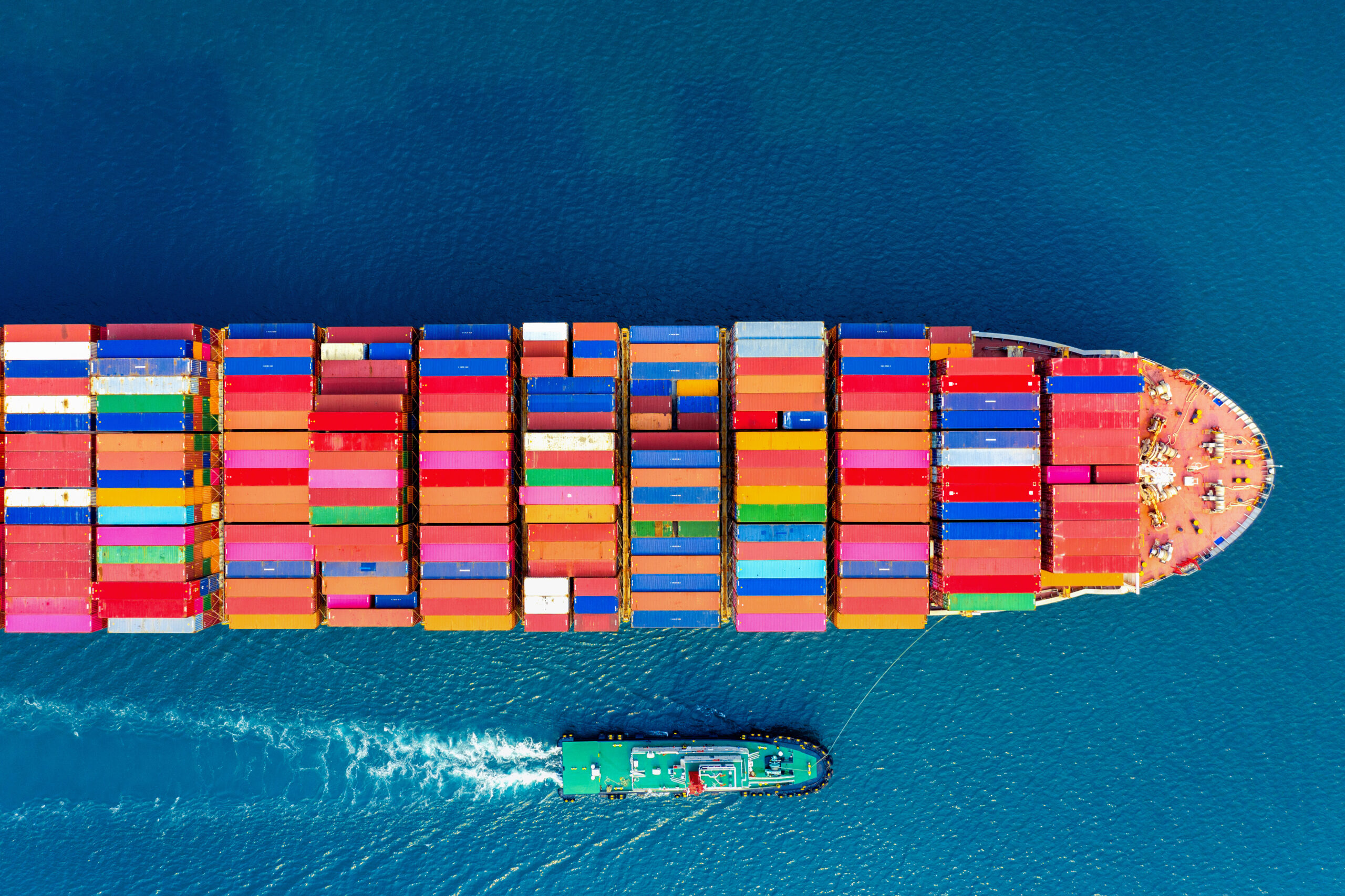 aerial view of container cargo ship in sea scaled