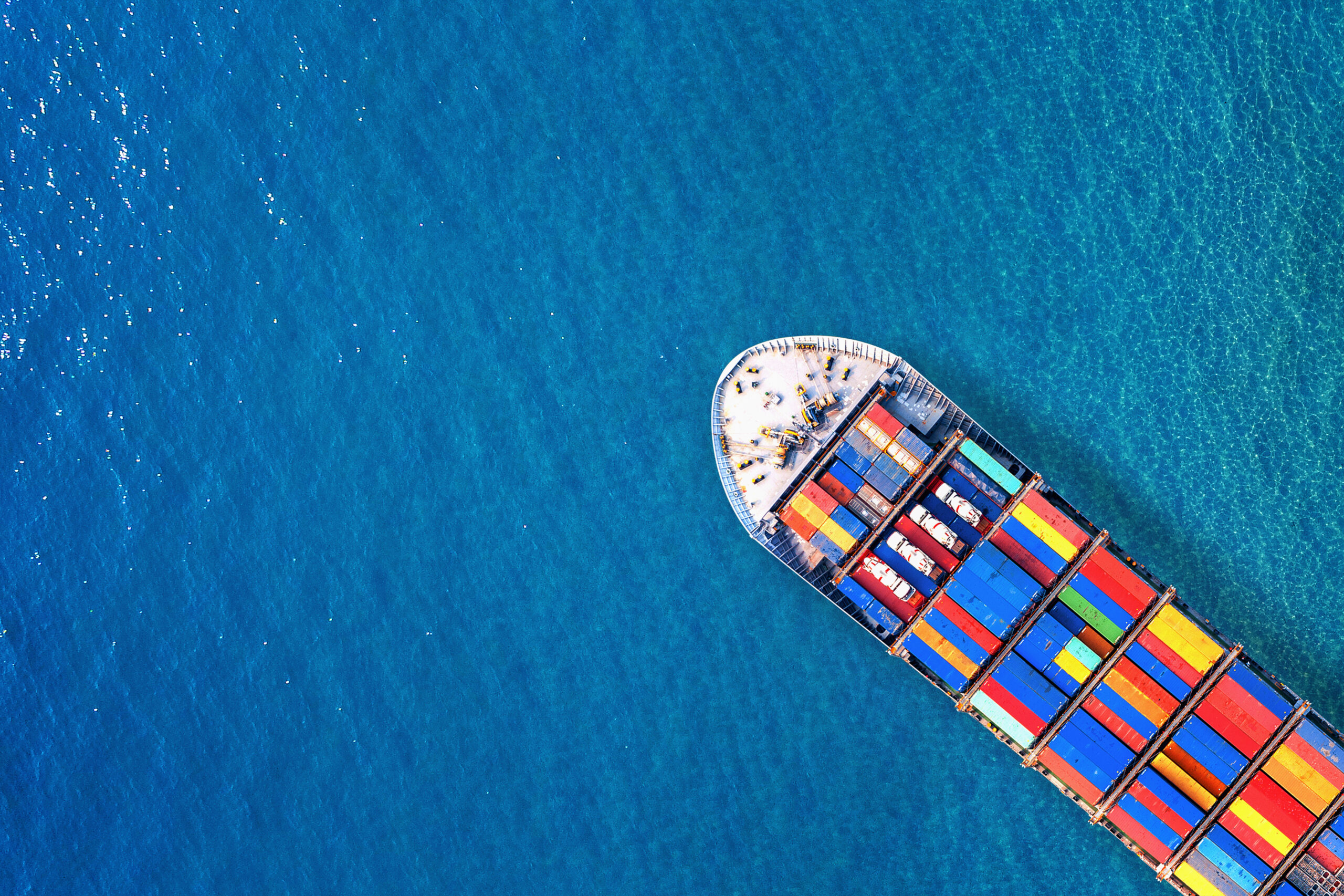 aerial view of container cargo ship in sea 2 scaled